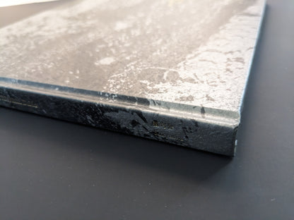 Close-up of the spine of Daido Moriyama’s photobook 1980s Remnants published by Sokyusha