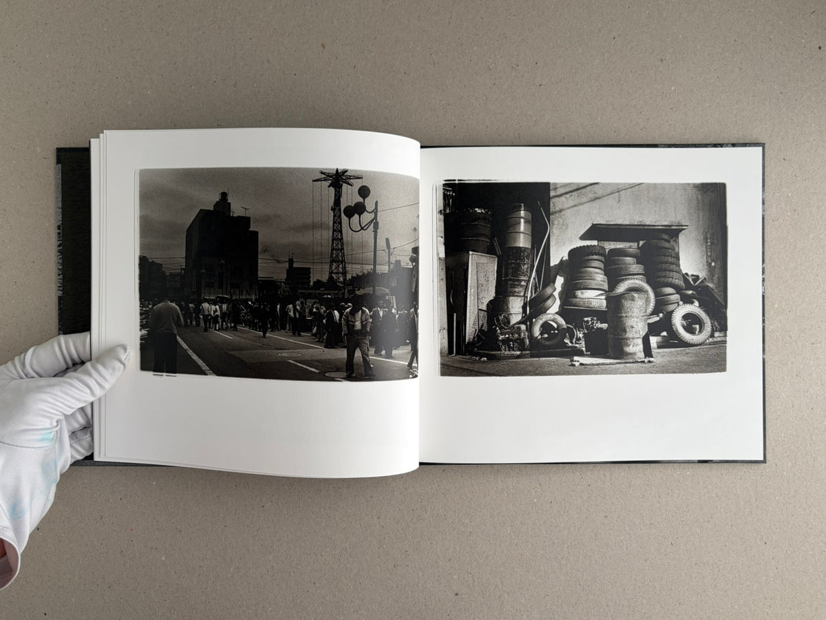 Open spread of 1980s Remnants by Daido Moriyama, showing two black-and-white photographs on facing pages.