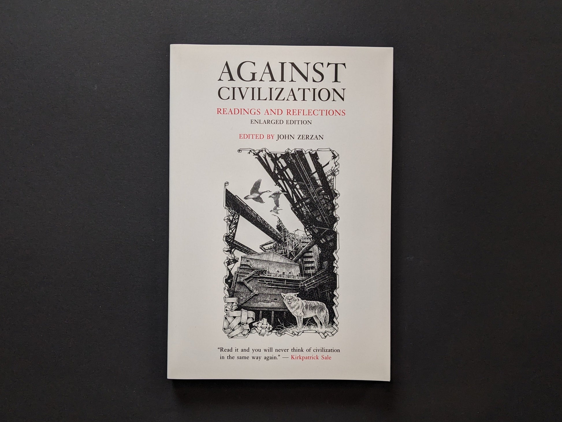 Front cover of the book Against Civilization featuring industrial ruins and a wolf - Against Civilization – Edited by John Zerzan - Lokator100