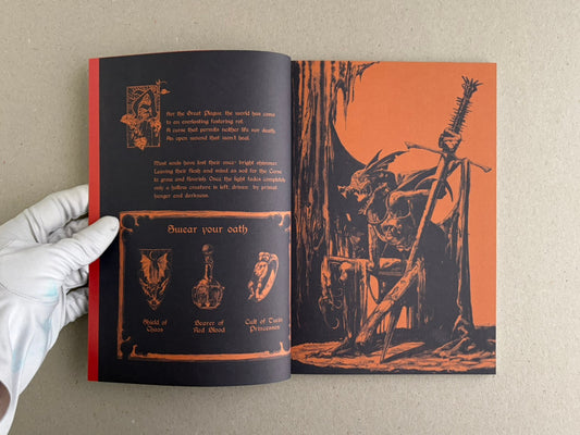 Age of Rot interior spread with orange and black artwork, text blocks, and a gloved hand holding the book open.