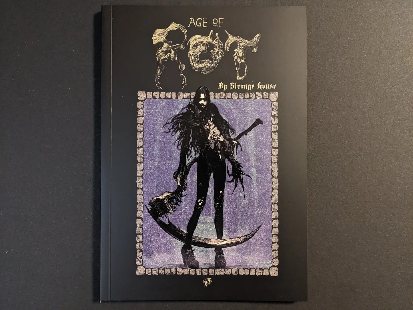 Front cover of Age of Rot by Strange House showing a dark fantasy warrior with scythe and sword framed by a purple stone border.