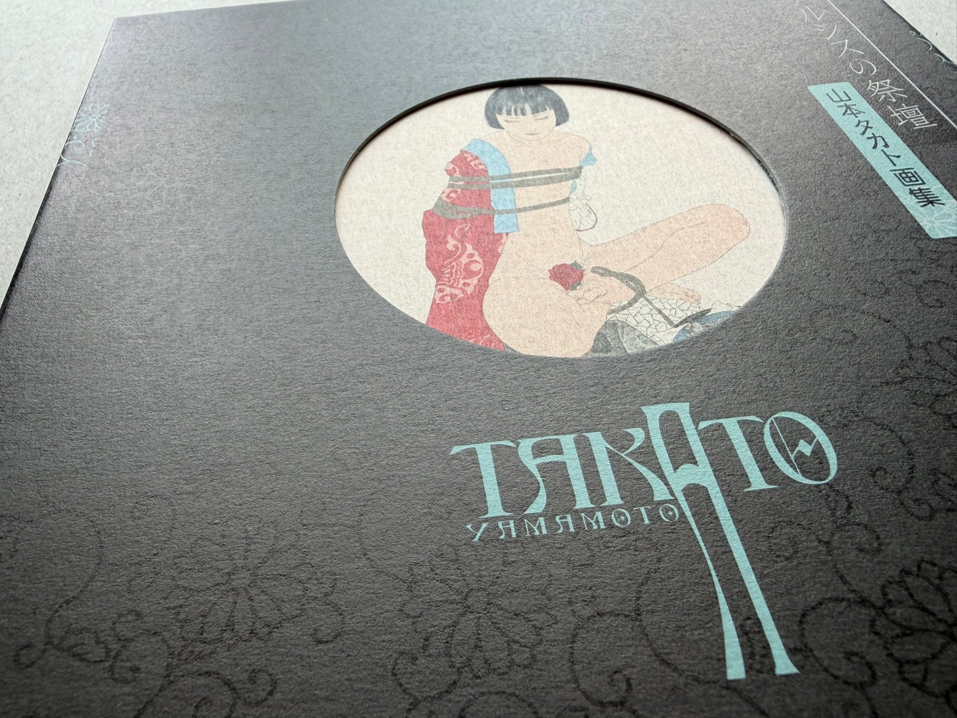 Altar of Narcissus by Takato Yamamoto, New Black Edition, close-up of the front cover and sleeve