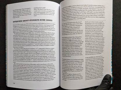 Interior spread of America's Greatest Noise with an interview about the Stomach Ache label.