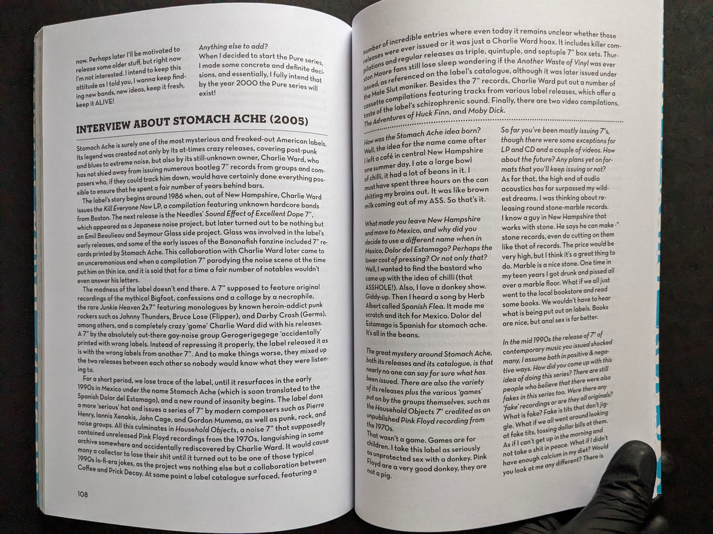 Interior spread from America’s Greatest Noise featuring an interview about the Stomach Ache label.