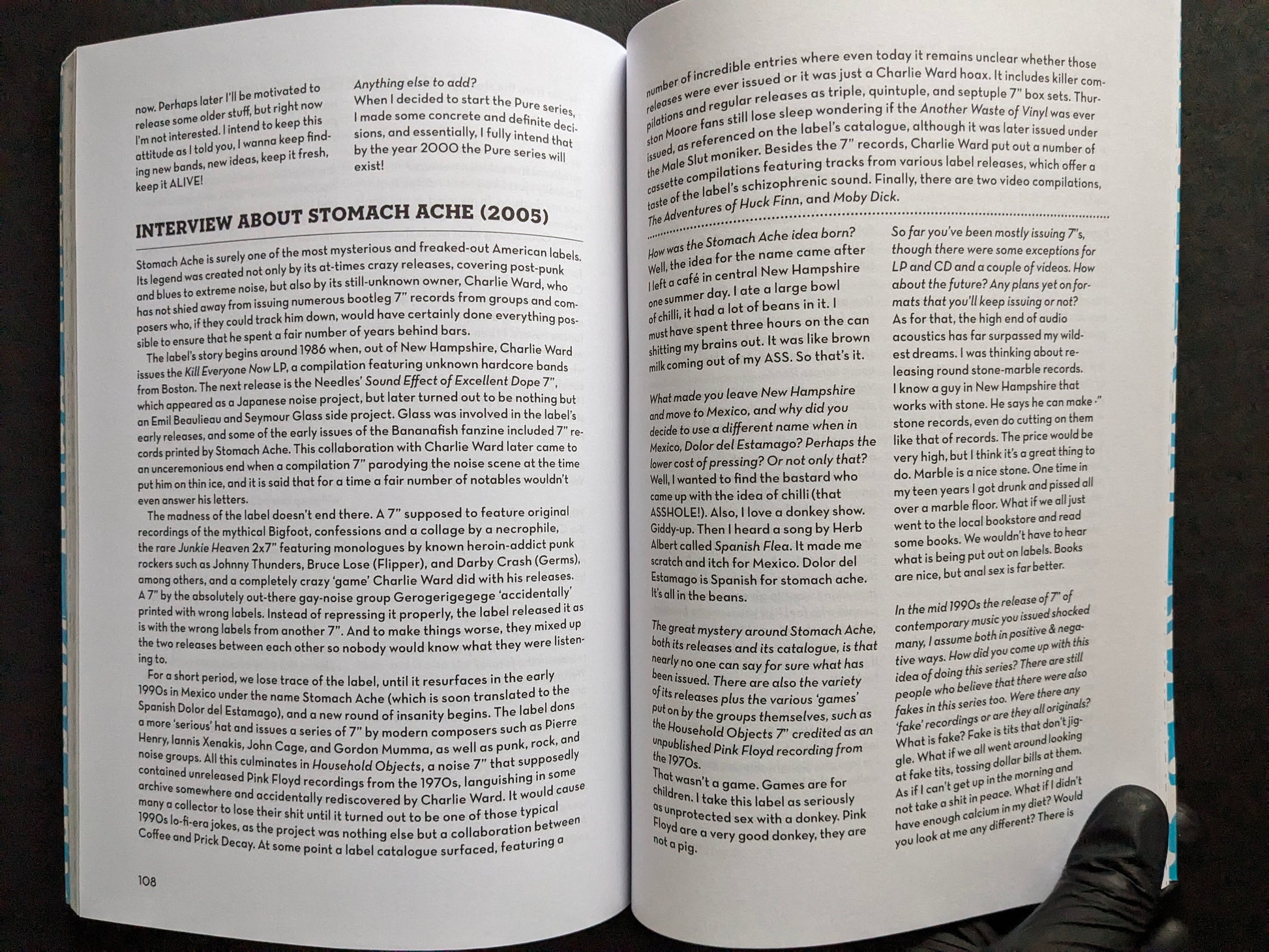 Interior spread from America’s Greatest Noise featuring an interview about the Stomach Ache label.