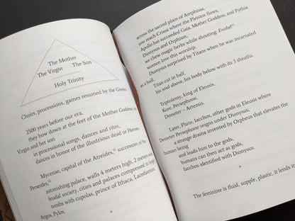 Text spread on the Mother Goddess, the Holy Trinity, and Dionysian ritual in ancient Greek traditions.