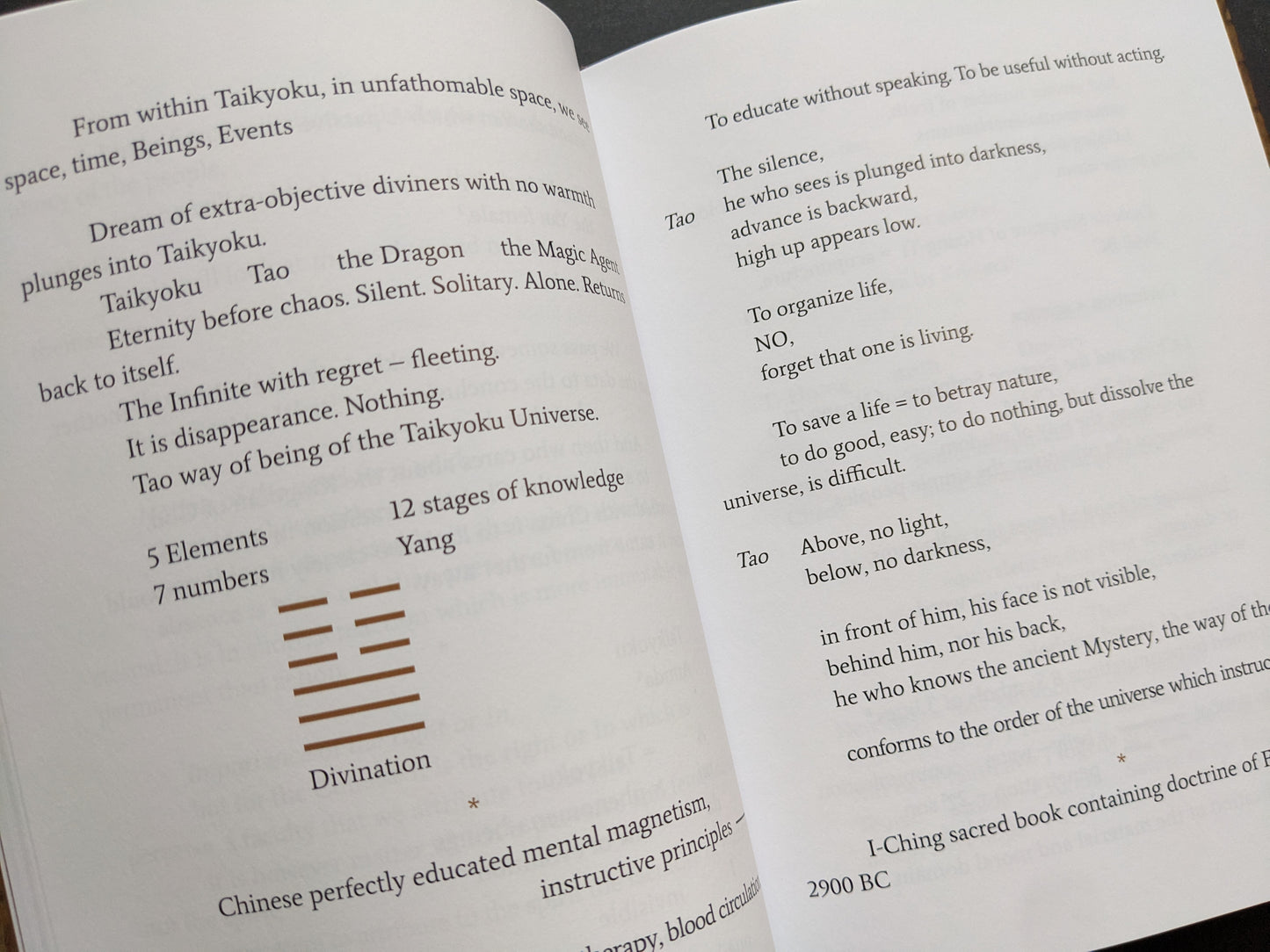 Spread with mystical text, Taoist cosmology, numbers, and divination references.