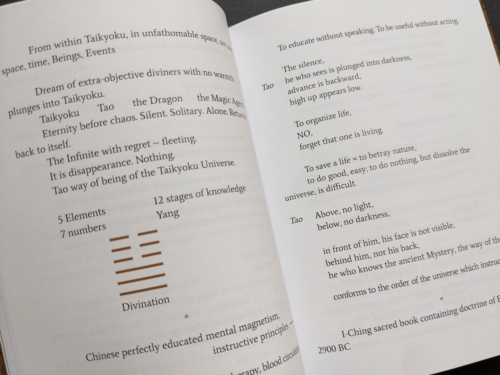 Spread with mystical text, Taoist cosmology, numbers, and divination references.