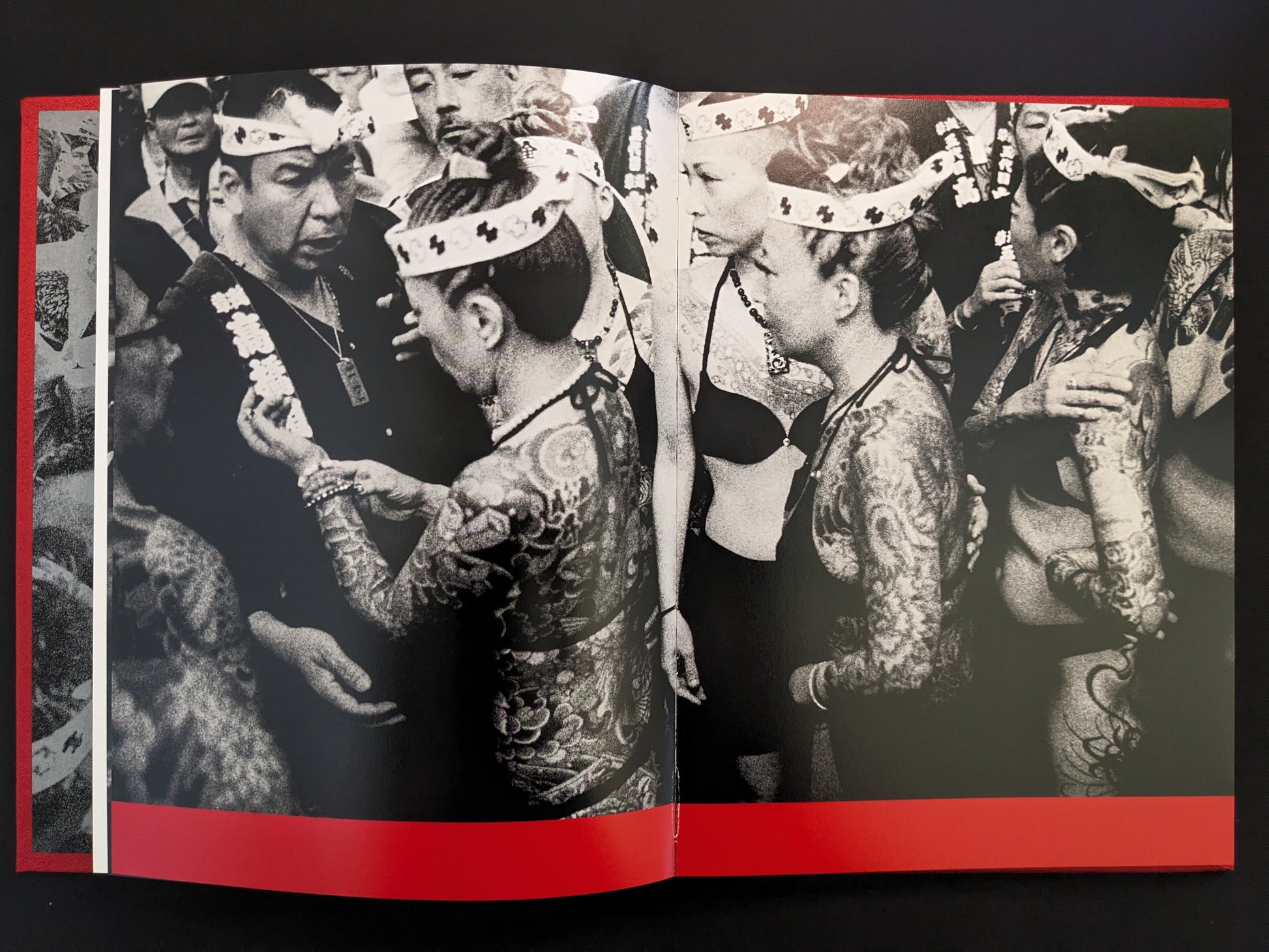 Close-up of tattooed festival participants in black and white