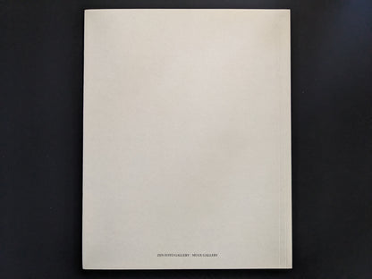 Back cover of Ash (New Edition) by Muge, minimalist design.