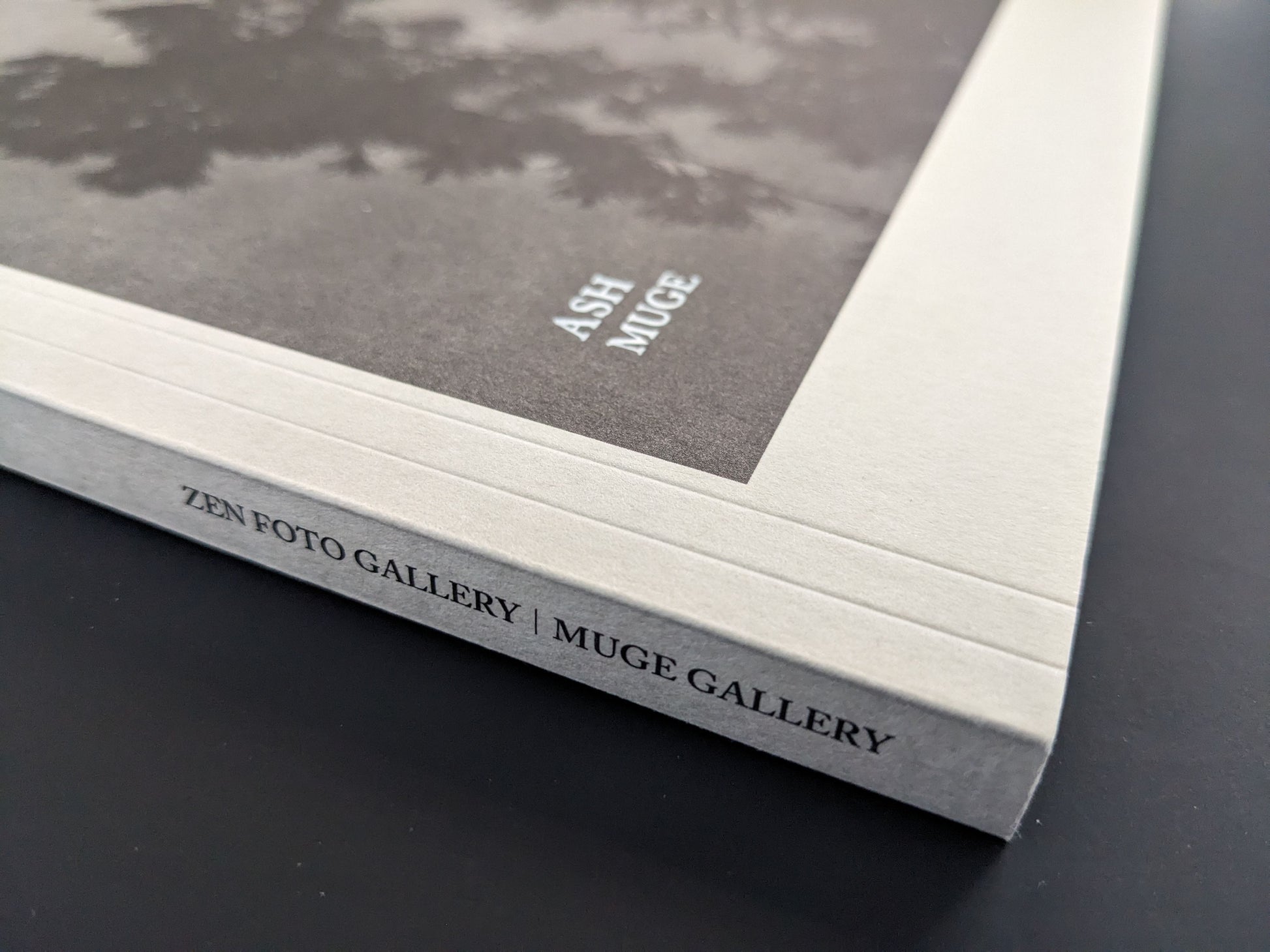 Spine of ASH (New Edition) by Muge, showing Zen Foto Gallery and Muge Gallery imprint.