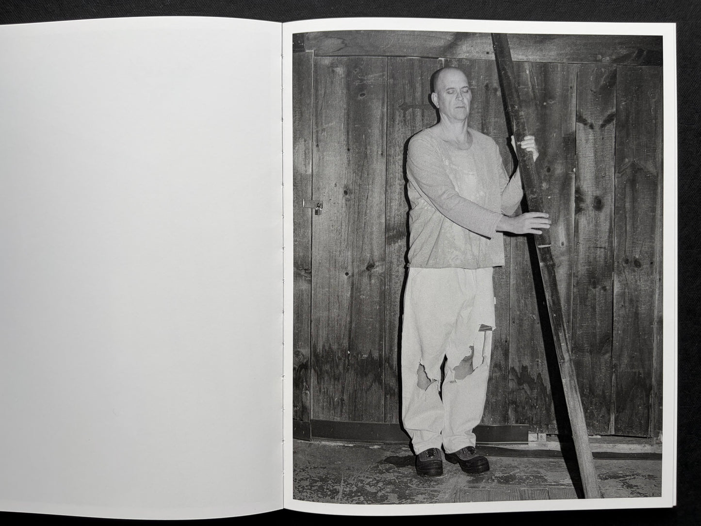At Night Gardens Grow by Pia-Paulina Guilmoth, open spread with a blank left page and a black-and-white portrait on the right