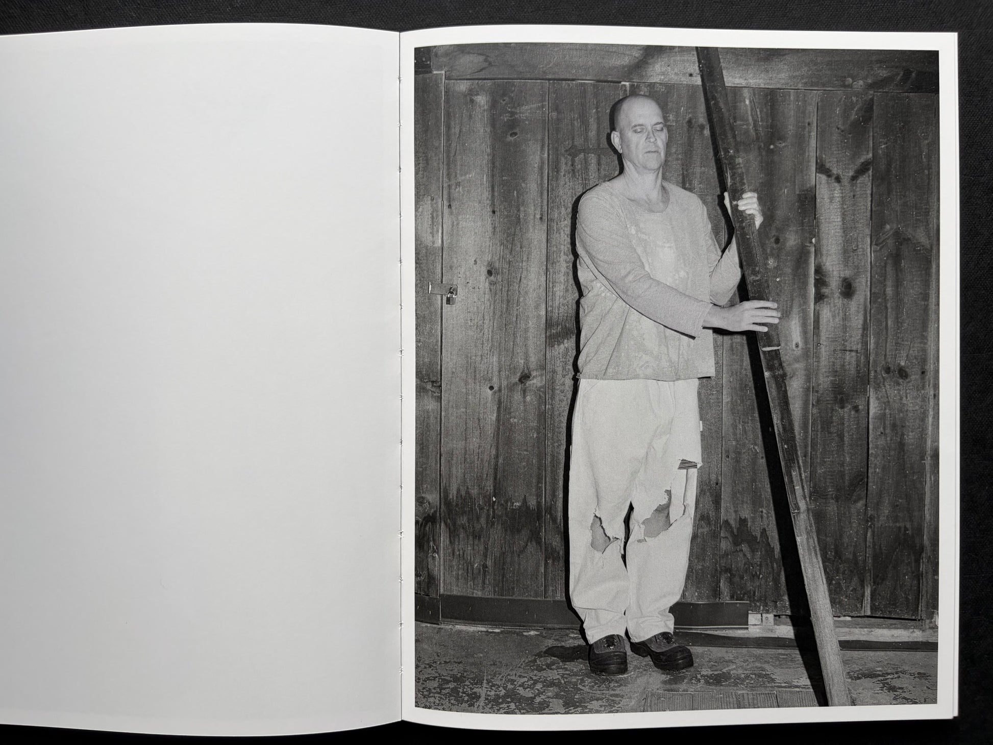 At Night Gardens Grow by Pia-Paulina Guilmoth, open spread with a blank left page and a black-and-white portrait on the right