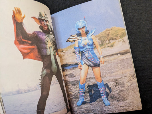Interior spread from Bad People featuring colorful Japanese TV series villain and heroine costumes in an outdoor setting.