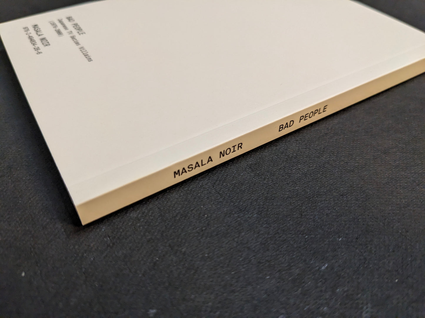 Spine detail of Bad People by Masala Noir.