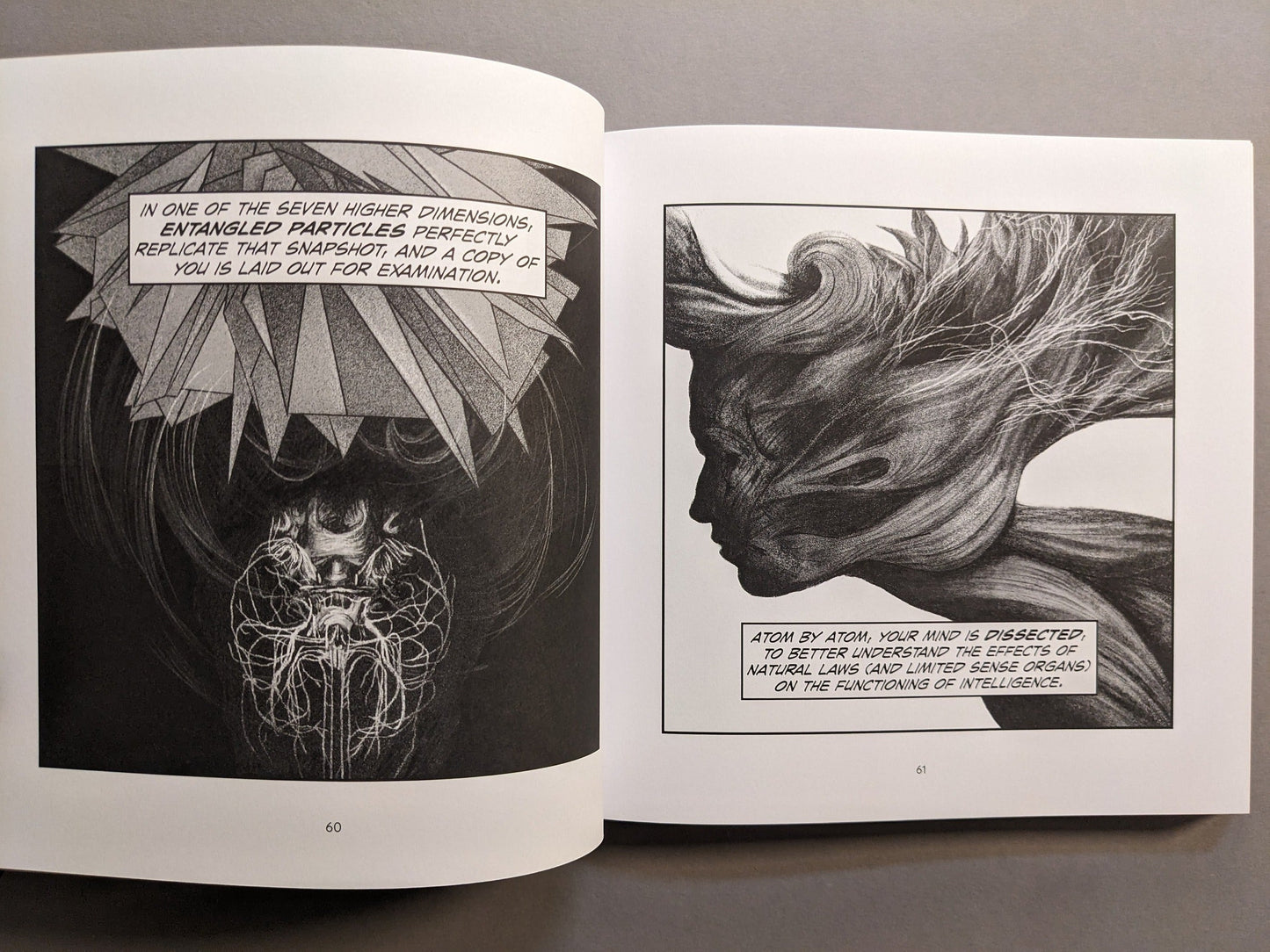 Interior spread with abstract brain imagery and crystalline forms in black and white.