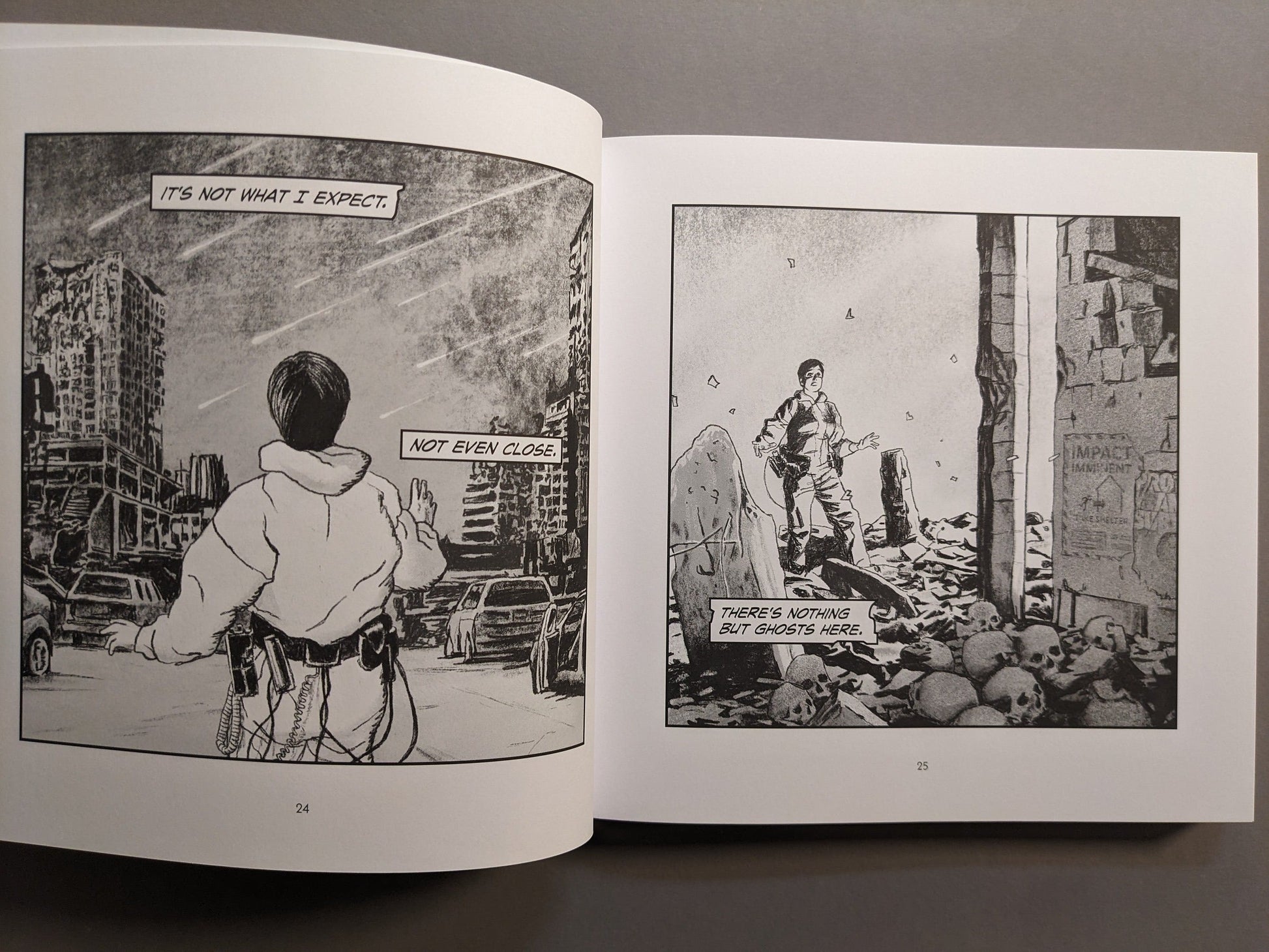 Interior spread with a ruined cityscape, rubble, and skulls in monochrome sci-fi art.