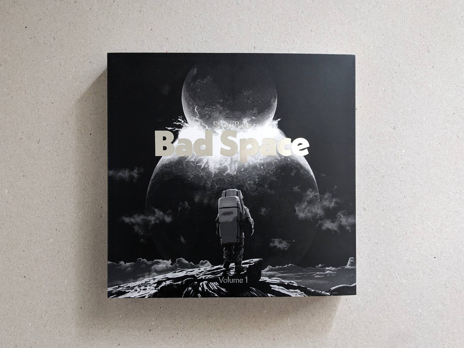 Front cover of Bad Space Volume 1 by Scott Base, with hot silver stamping on the softcover.