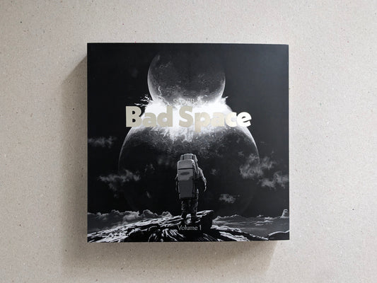 Front cover of Bad Space Volume 1 by Scott Base, with hot silver stamping on the softcover.
