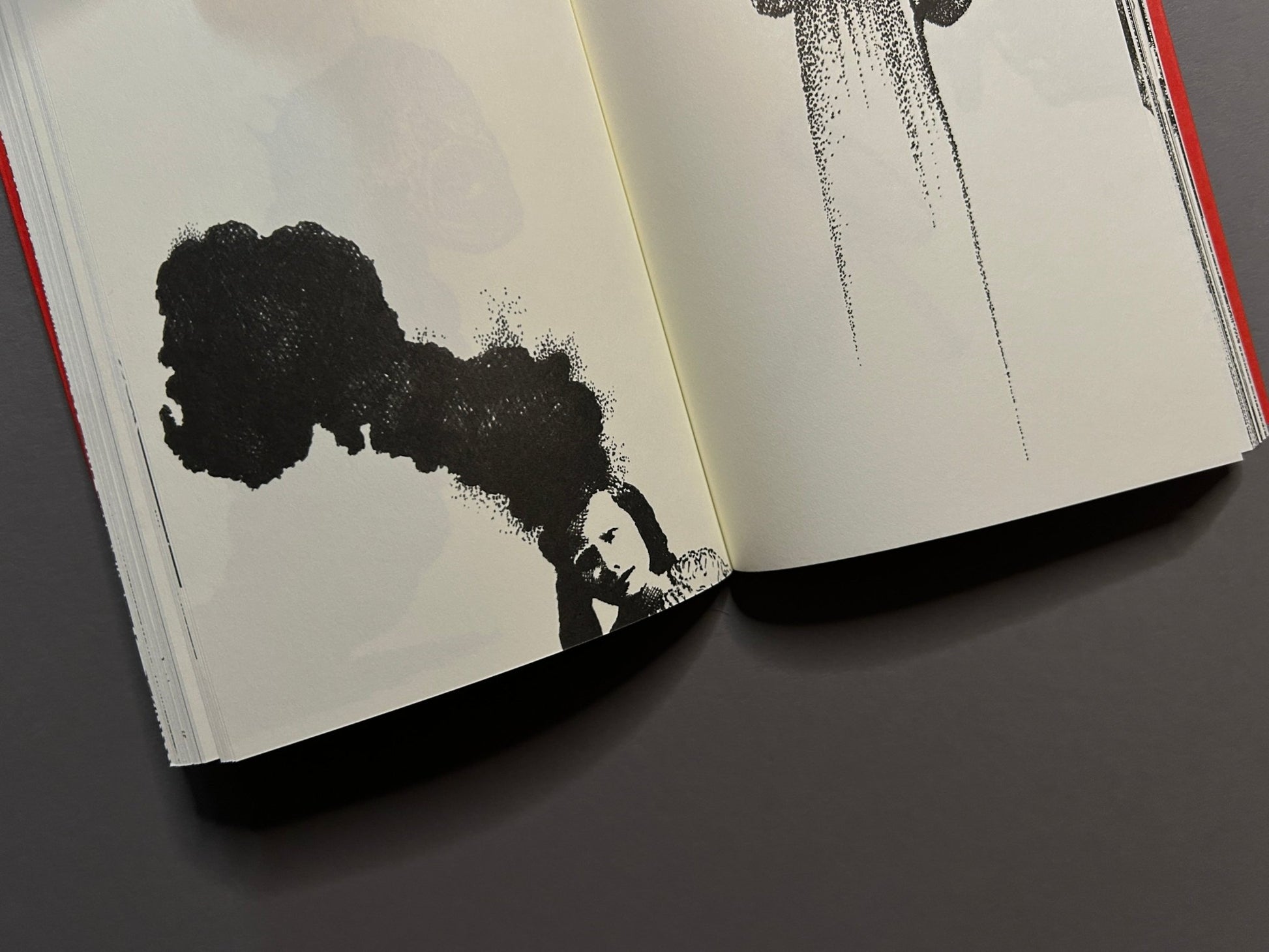 Bal de tête interior spread with black ink drawings on cream pages