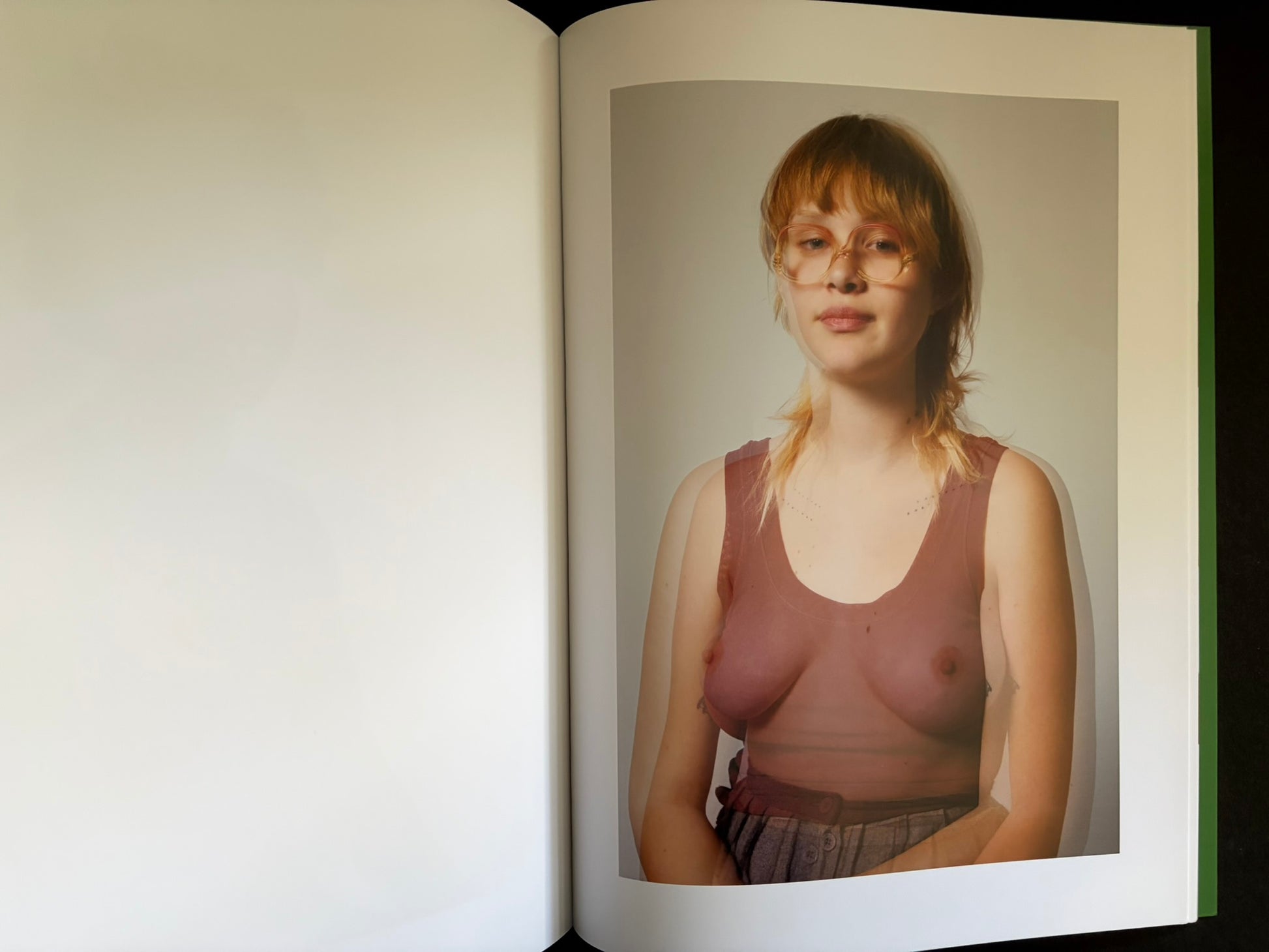 Open Baron Issue 7 by Richard Kern with a portrait in a sheer top on the right-hand page
