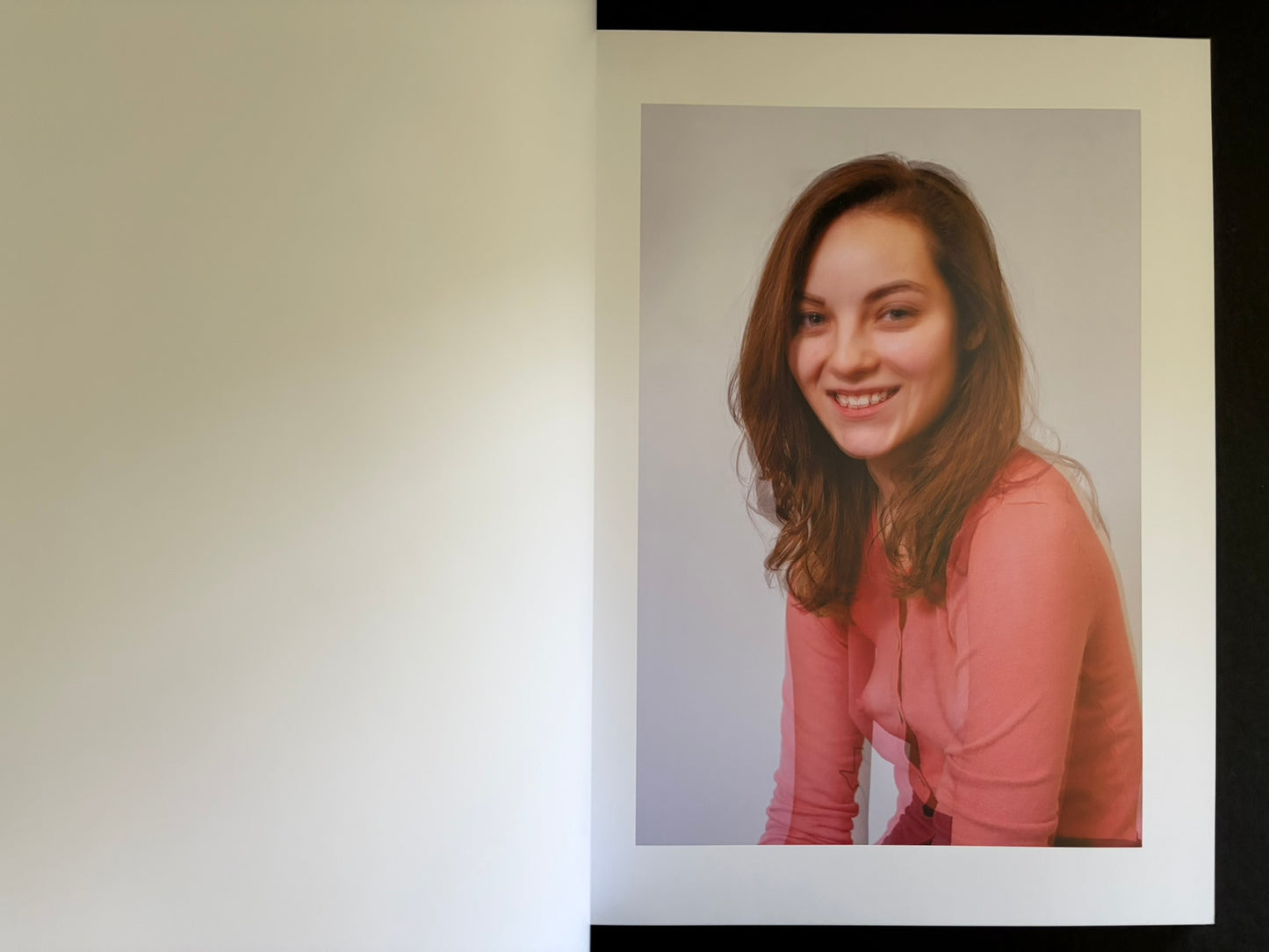 Open Baron Issue 7 by Richard Kern with a smiling portrait on the right-hand page