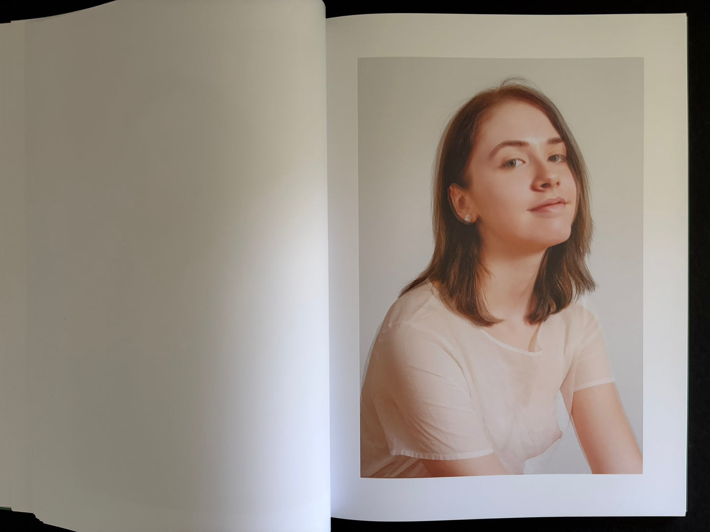 Open Baron Issue 7 by Richard Kern with a portrait in a striped dress on the right-hand page