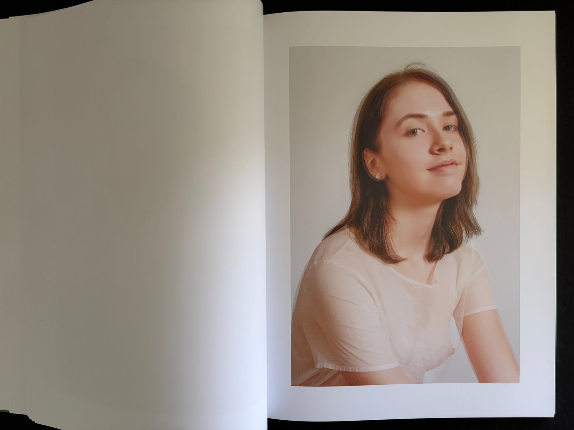 Open Baron Issue 7 by Richard Kern with a portrait in a striped dress on the right-hand page
