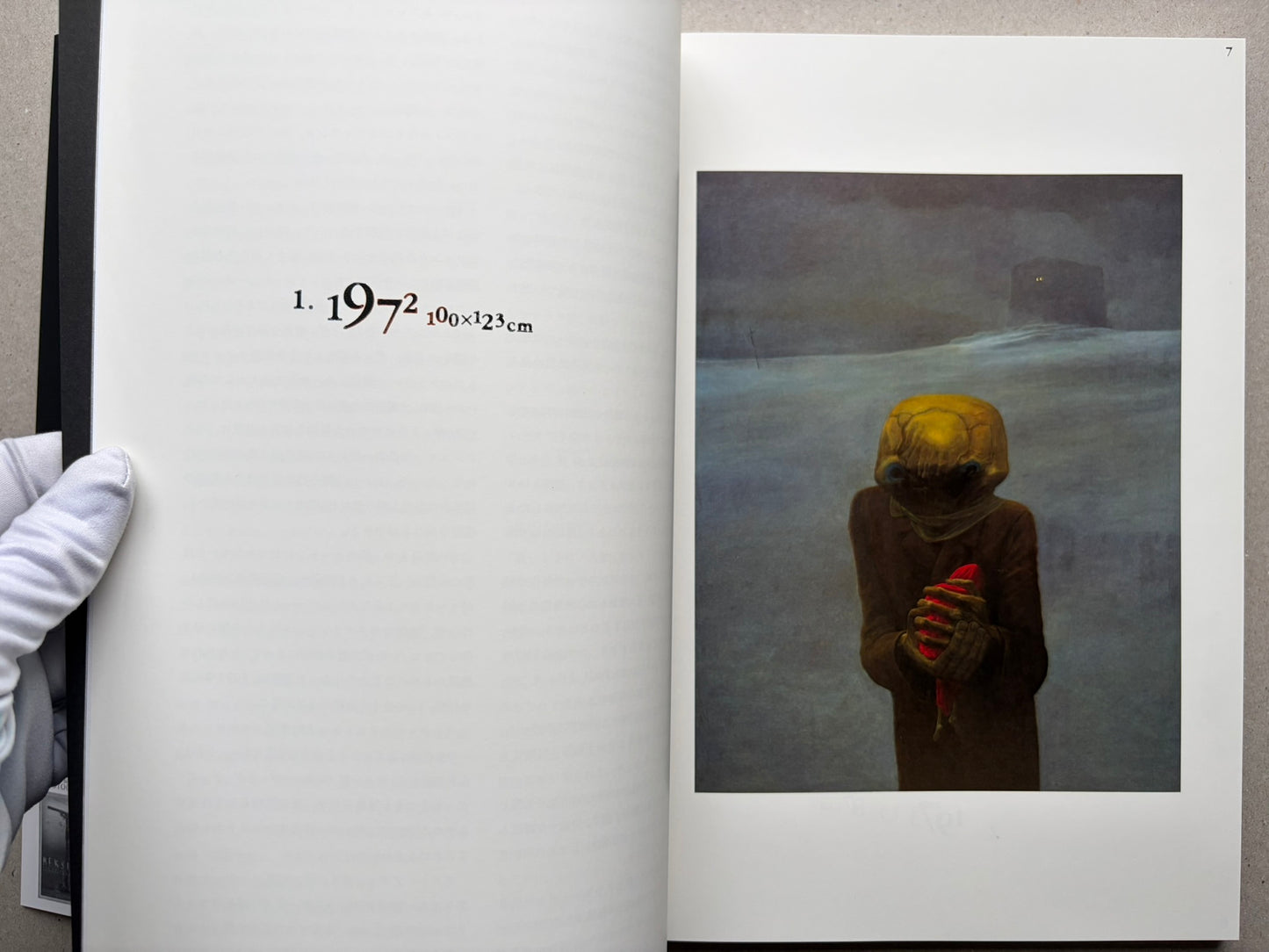 Interior spread from Beksinski 1929-2005 with a painting reproduction on the right and a page number at top right.