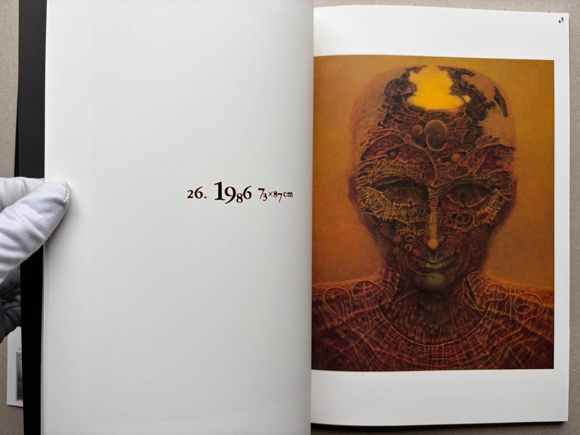 Interior spread from Beksinski 1929-2005 showing a close-up reproduction on the right-hand page.