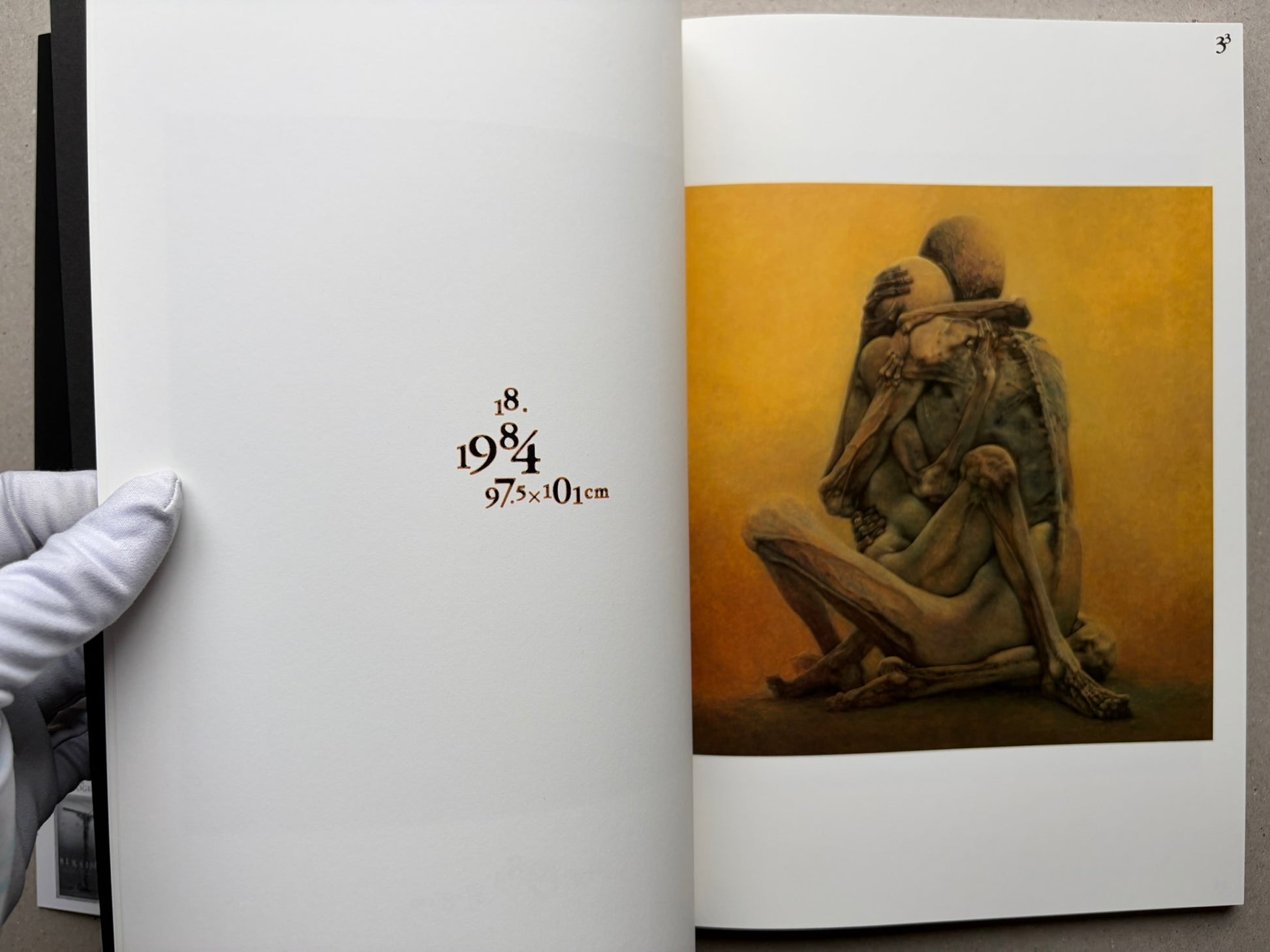 Interior spread from Beksinski 1929-2005 with two reproductions on facing pages.