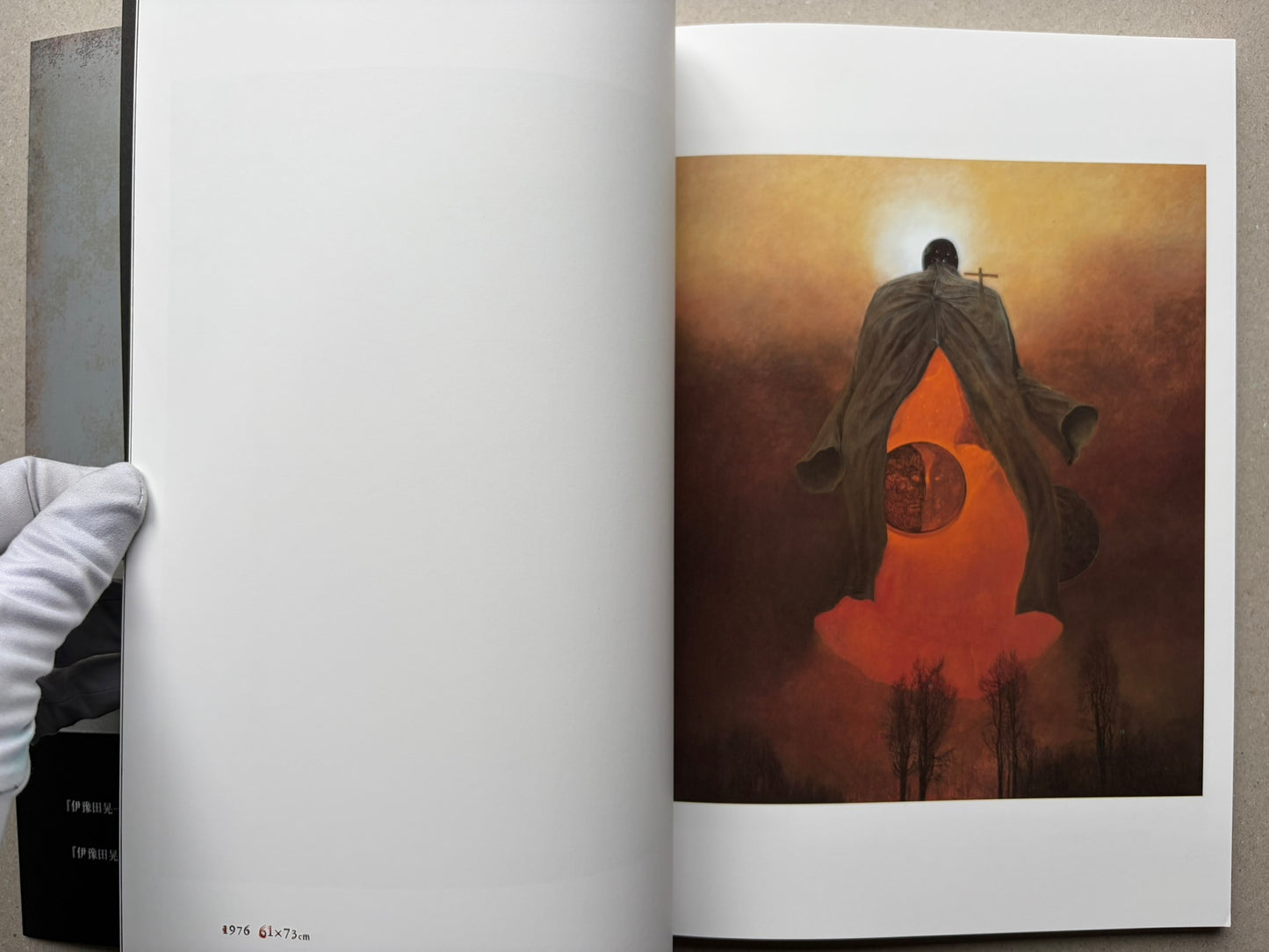 Open spread from Beksinski - The Collected Works I ver. 1.2 with a full-page orange painting of a cloaked figure.