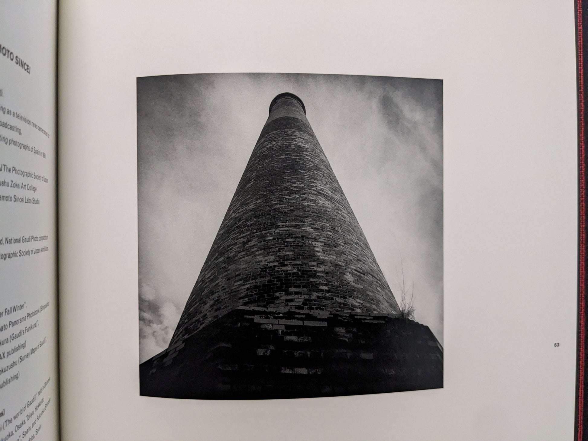 Vertical brick smokestack against the sky, from Berg Werk by Sincei Yamamoto
