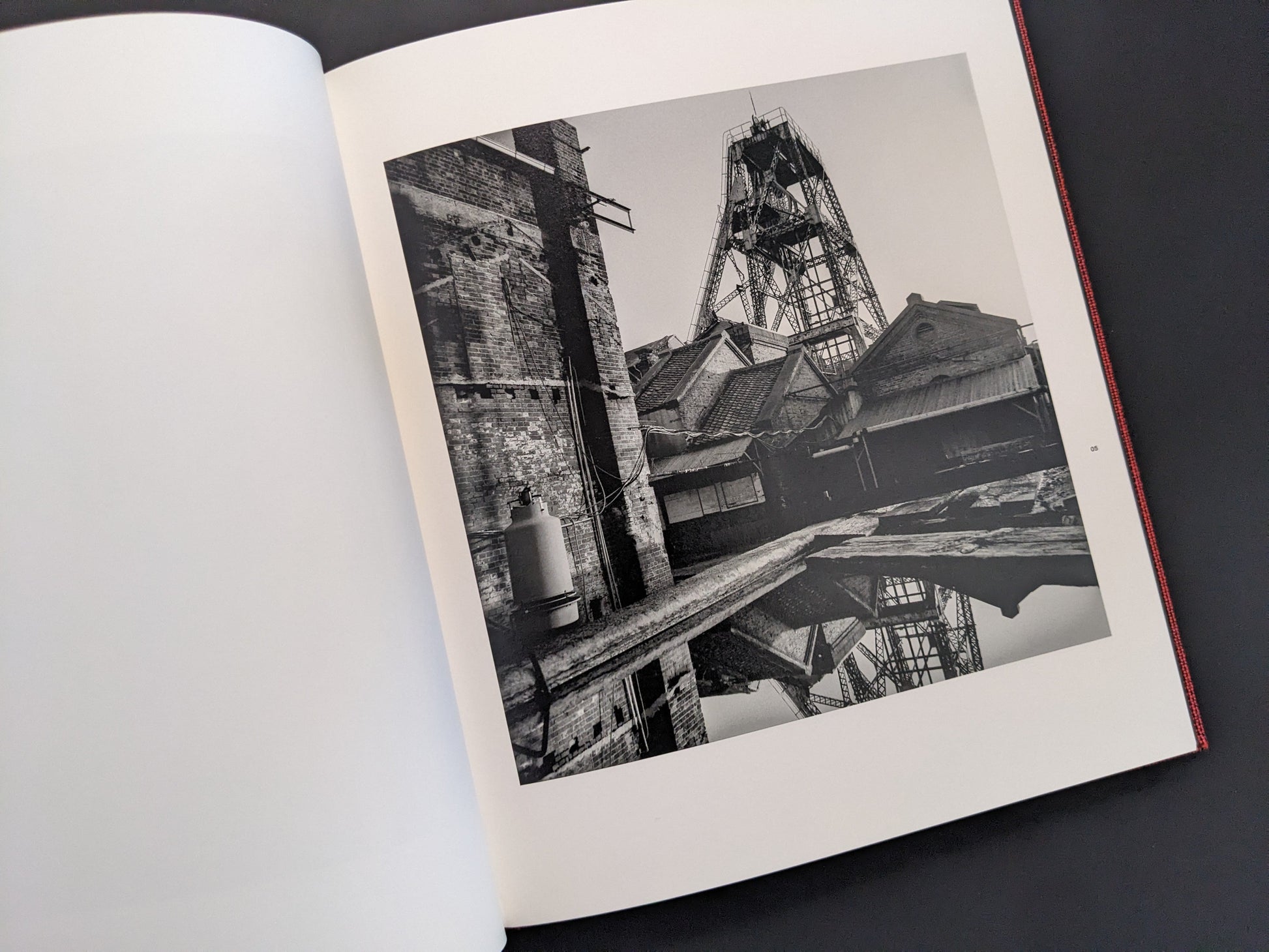 Black-and-white photograph of coal mine industrial structure from Berg Werk by Sincei Yamamoto