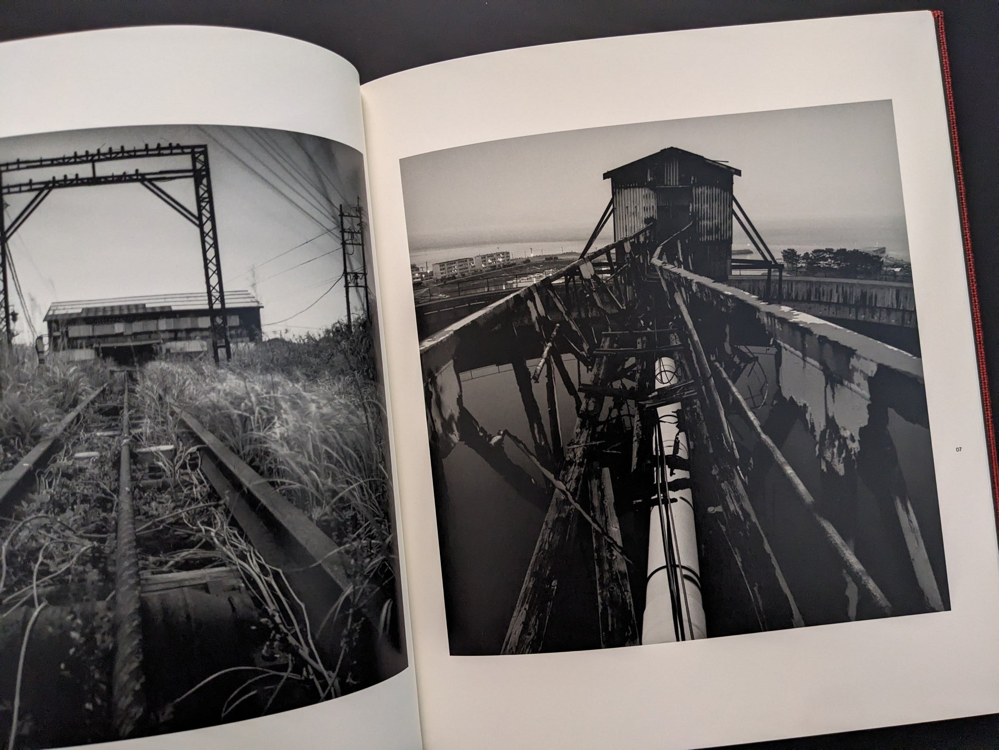Overgrown industrial railway tracks near coal mine, from Berg Werk by Sincei Yamamoto