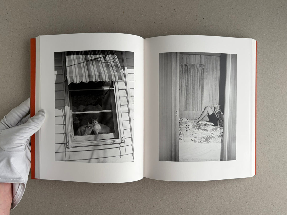 Open spread of between the skin and sea by Katrin Koenning, showing two black-and-white photographs on facing pages.
