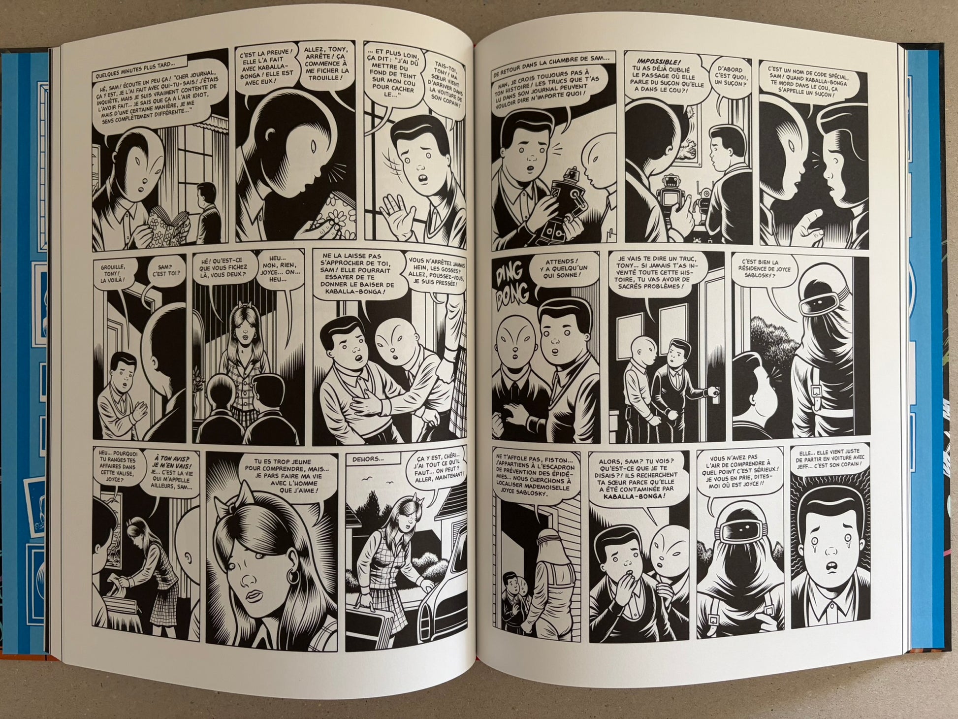 Open black-and-white comic spread from Big Baby with dense French dialogue panels.