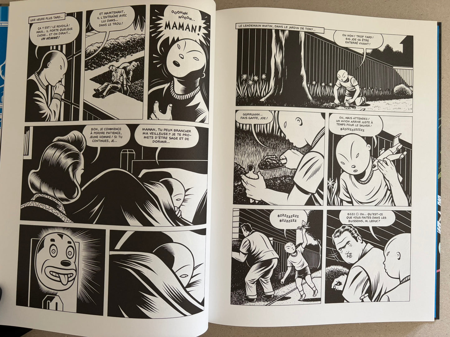Open black-and-white comic spread from Big Baby with French dialogue and multiple panels.