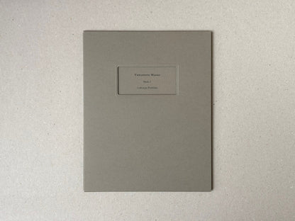 Birds 2 by Masao Yamamoto, grey portfolio case with title label on the front.