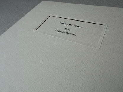 Birds by Yamamoto Masao, portfolio cover with a recessed label reading "Yamamoto Masao / Birds / Collotype Portfolio".