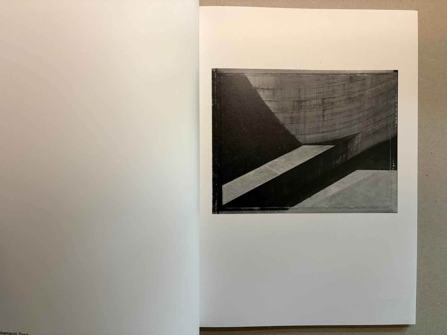 Boundary Hunt by Toshio Shibata, open spread with a small black-and-white photograph on the right page.
