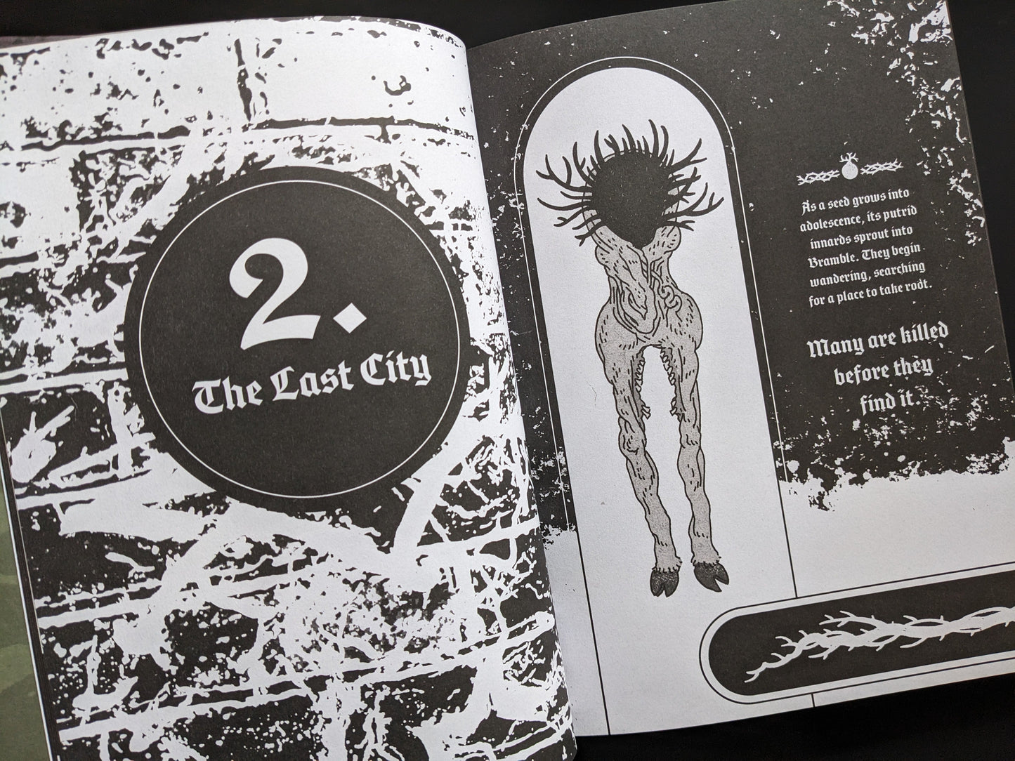Chapter two "The Last City" from Bramble, with surreal creature artwork and lore text.