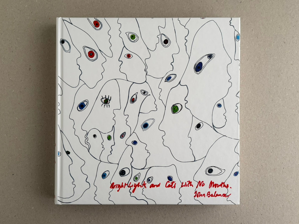 Bright Lights and Cats with No Mouths hardcover front cover with white background, line-drawn faces, and red handwritten title and John Balance signature.