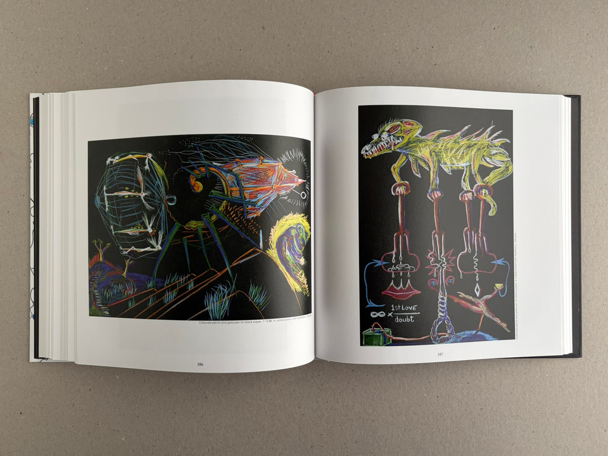 Bright Lights and Cats with No Mouths open to pages 186 and 187, showing neon-coloured drawings on black paper.