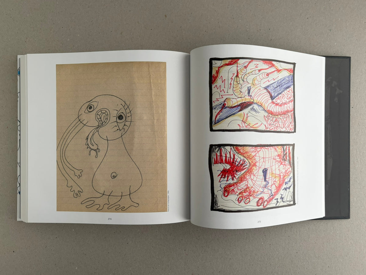 Bright Lights and Cats with No Mouths open to pages 274 and 275, with a simple figure drawing on the left and two framed drawings on the right.