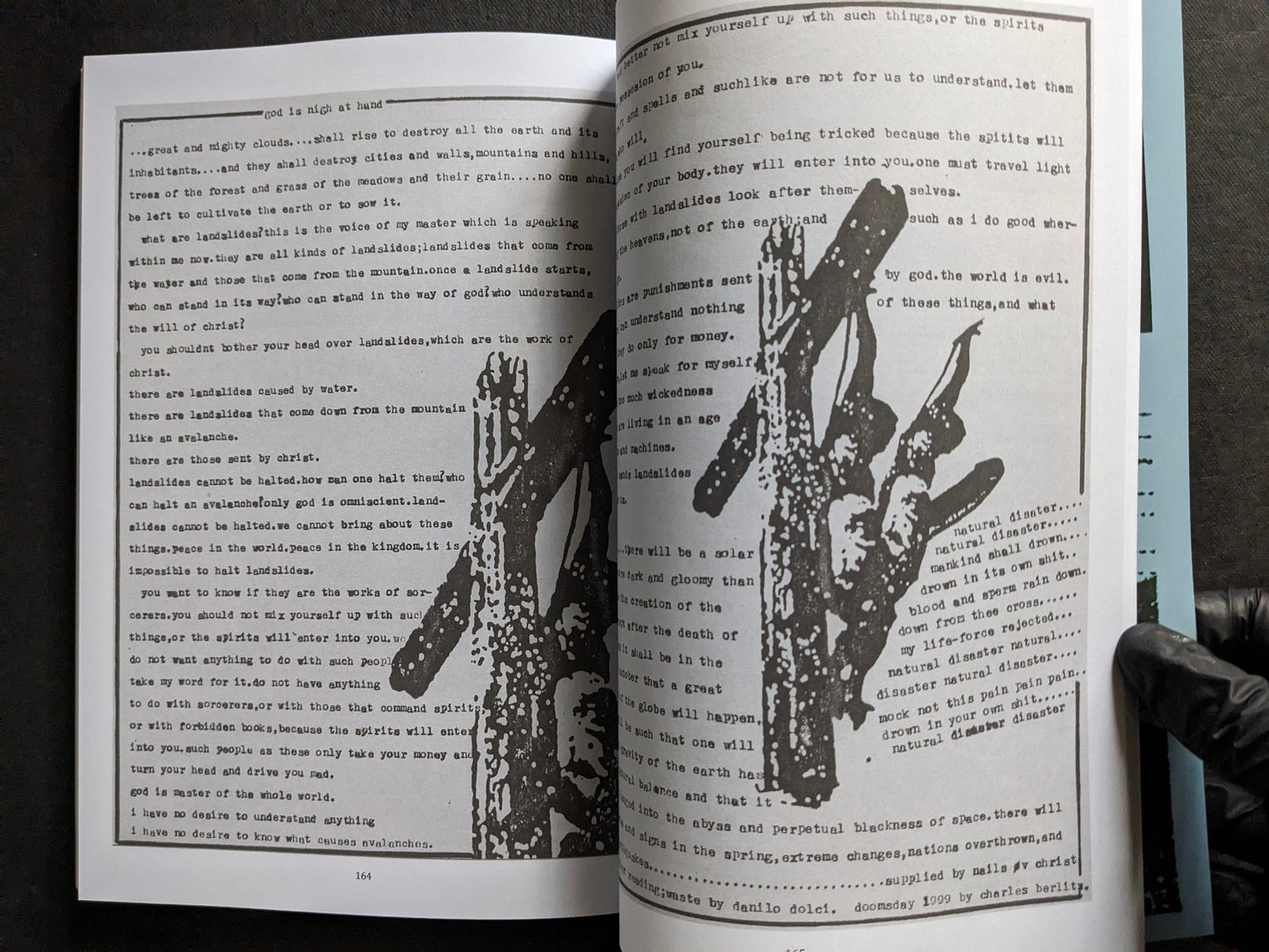 Interior spread with dense typewritten text and stark black-and-white artwork from the Broken Flag story book.