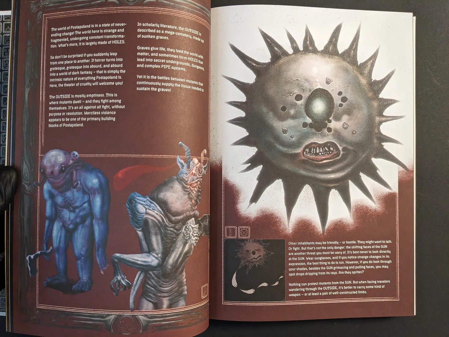 Spread from Bubzium showing blue and grey mutant figures and a spiked sun-god face floating above a red ground.