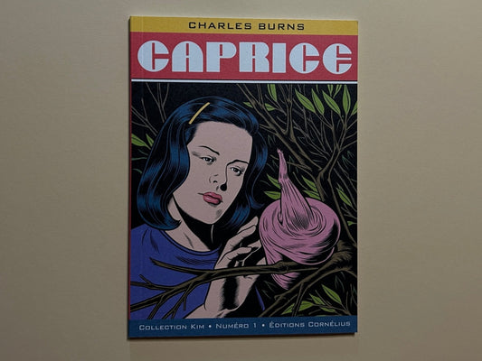 Caprice by Charles Burns, front cover with a woman in front of dark branches holding a pink, organic form.