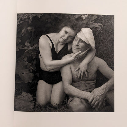 Interior photo from Cheryomushki: black-and-white portrait of a couple in swimwear, posed closely outdoors.