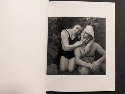 Interior photo from Cheryomushki: black-and-white portrait of a couple in swimwear, posed closely outdoors.